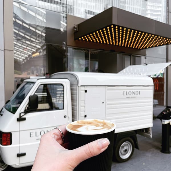 Mobile Coffee Van Serving Guests Outdoors
